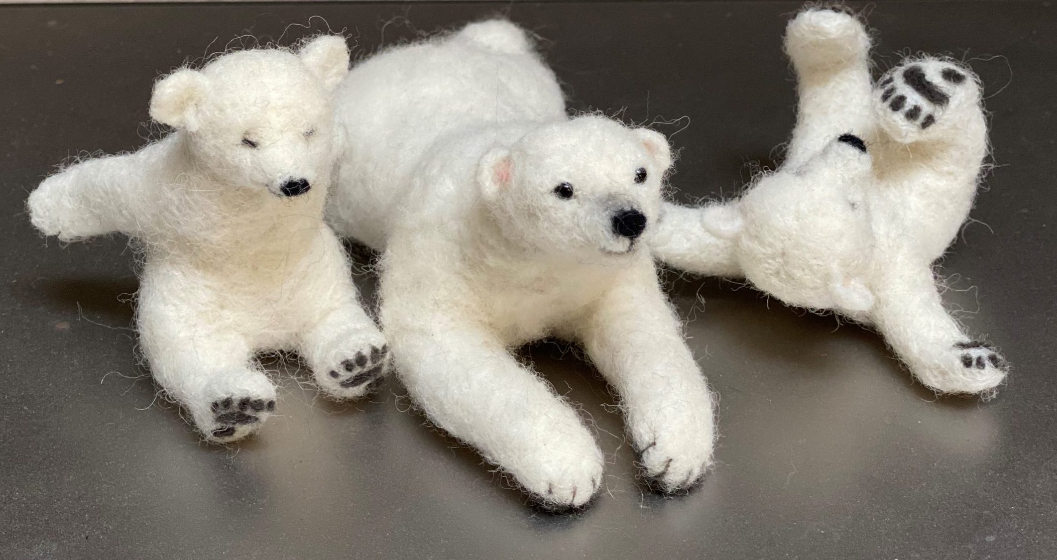 3 miniture felted polar bears.